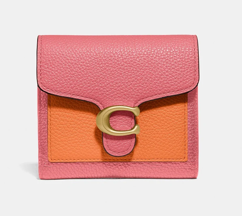 COACH（コーチ）、ピンク×オレンジの財布
