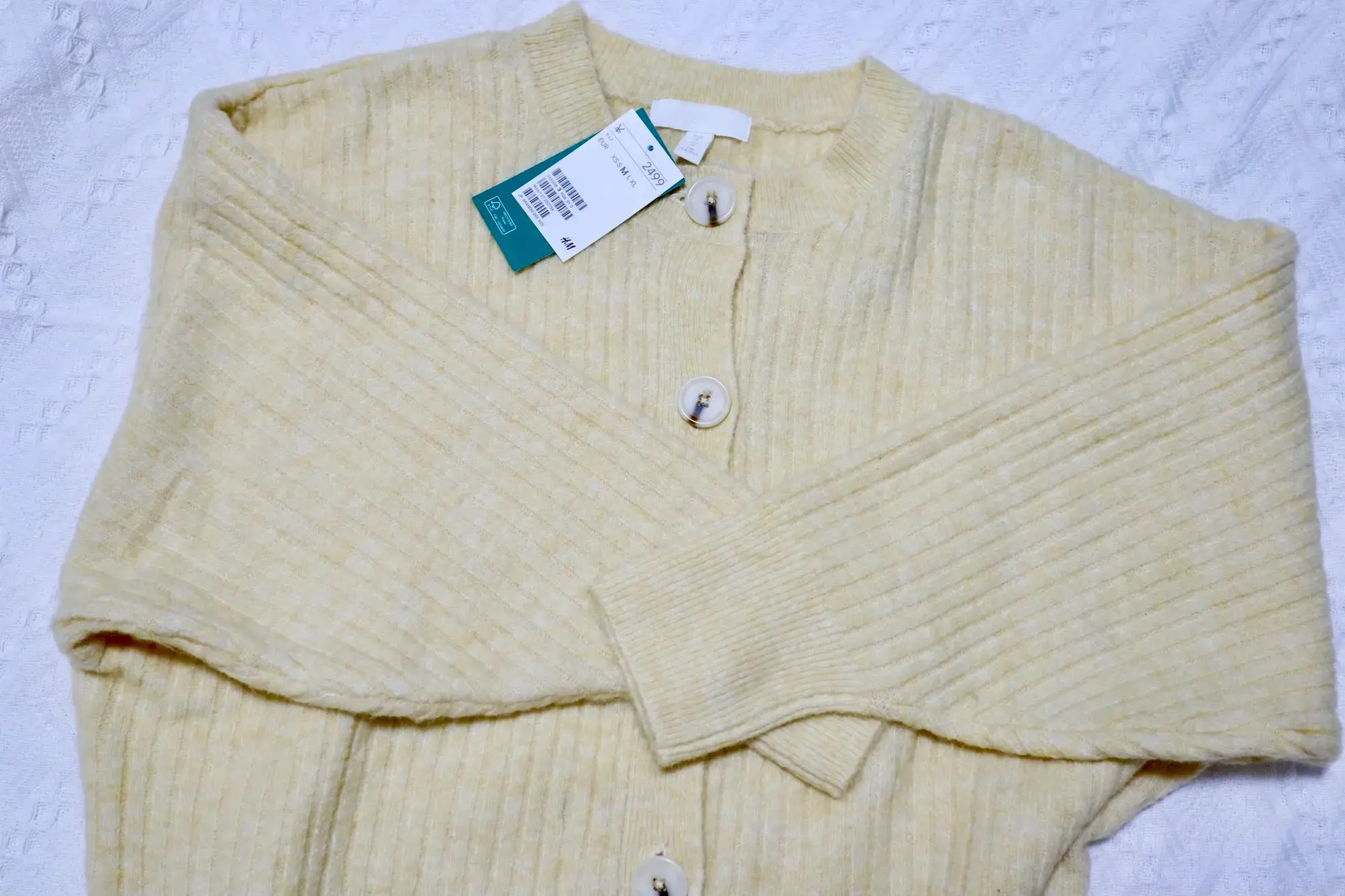『H&M』のカーディガン